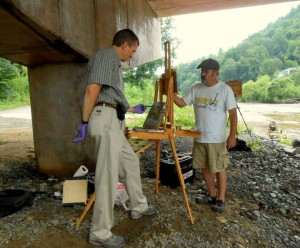 Scott Boyle and Bernie Rosage Jr. sharing an easel.