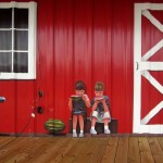 Lenoir County Farmer's Market mural, Kinston, NC. Detail of kids eating watermelon by North Carolina artist, Jeremy Sams.