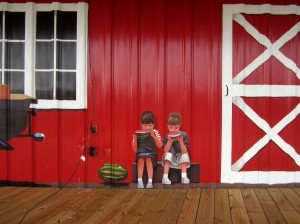 Lenoir County Farmer's Market mural, Kinston, NC. Detail of kids eating watermelon by North Carolina artist, Jeremy Sams.